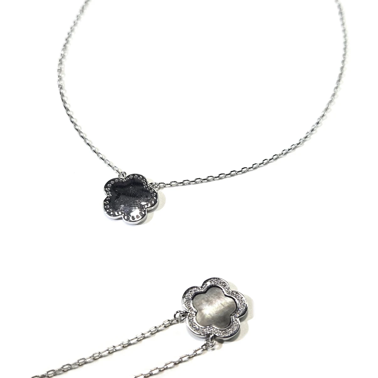 Four-leaf clover pendant front and back detail with crystal halo